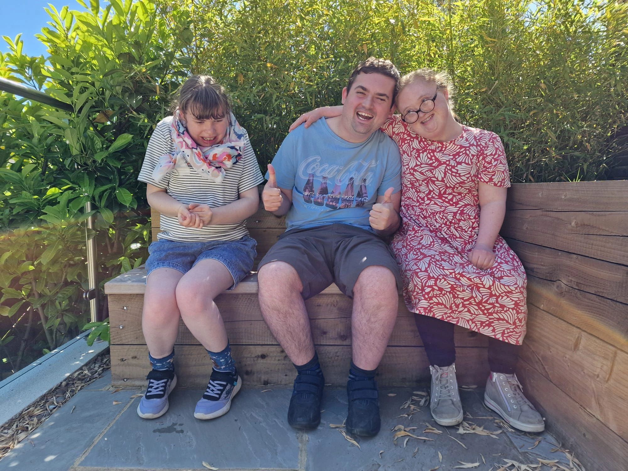 Young people from Horsforth enjoying time together in the sunny garden