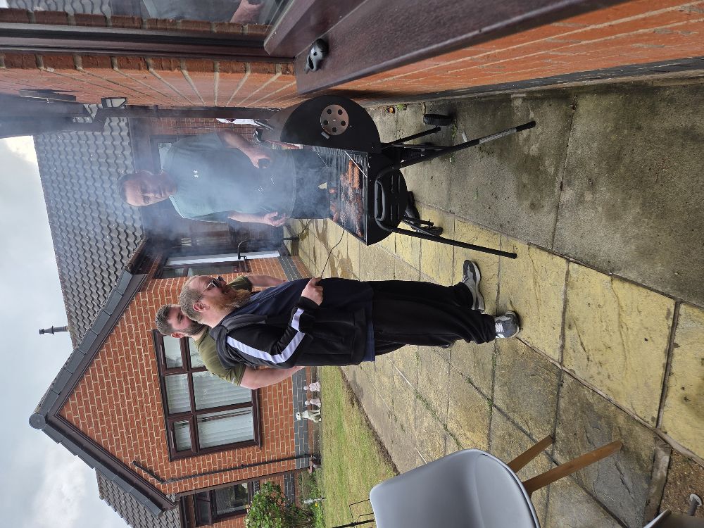 JL cooking on the barbecue